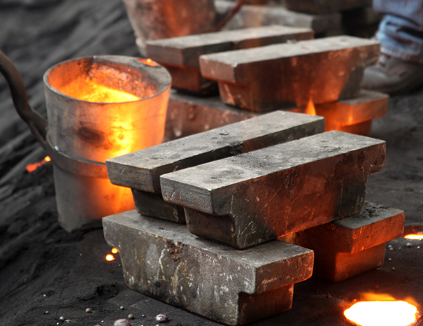 High chrome blow bars installed in an industrial impact crusher